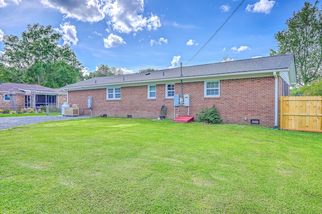 108 Reardon St, Moncks Corner, SC 29461 - rear view of house with brick siding, crawl space, and a shingled roof