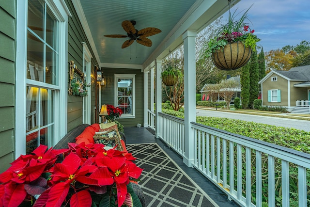 sunroom / solarium with ceiling fan