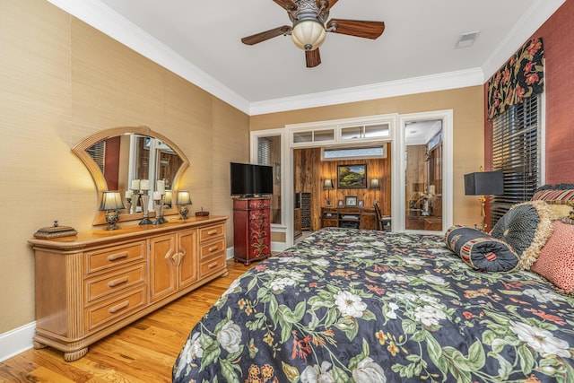 bedroom with ceiling fan, light wood-type flooring, and crown molding