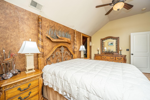 bedroom featuring ceiling fan and vaulted ceiling