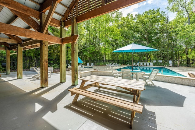 view of patio featuring a community pool