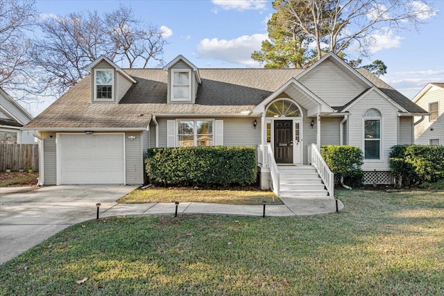 view of front facade featuring a front lawn and a garage