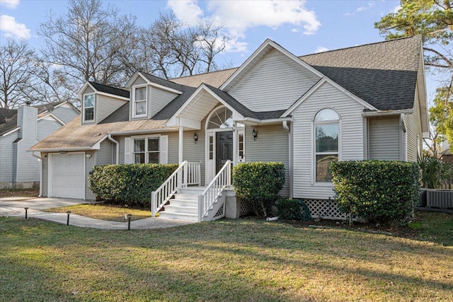 view of front facade with a front lawn and central air condition unit