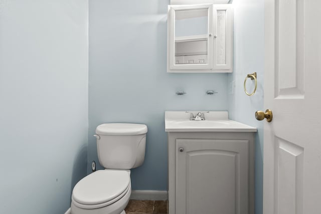 7914 Dutch Ct, North Charleston, SC 29420 - bathroom with toilet, vanity, and baseboards