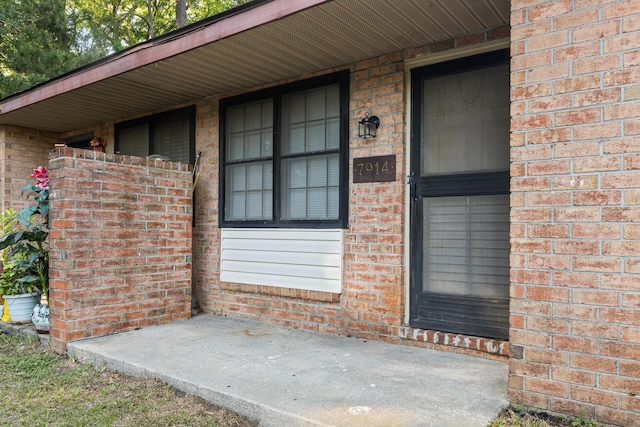 7914 Dutch Ct, North Charleston, SC 29420 - property entrance featuring brick siding and a porch