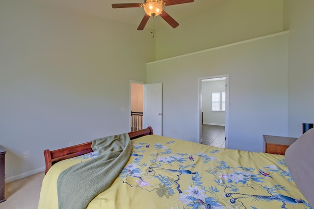 9682 Pebble Creek Blvd, Summerville, SC 29485 - tiled bedroom featuring a high ceiling, baseboards, and a ceiling fan