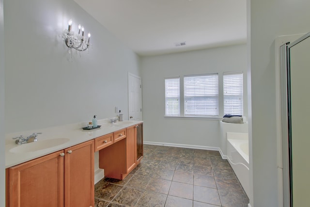 9682 Pebble Creek Blvd, Summerville, SC 29485 - full bath with a garden tub, an enclosed shower, baseboards, double vanity, and stone finish floors