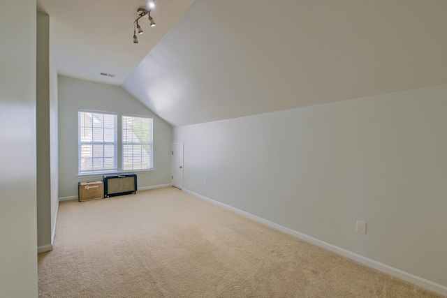 9682 Pebble Creek Blvd, Summerville, SC 29485 - additional living space featuring light carpet, baseboards, and vaulted ceiling