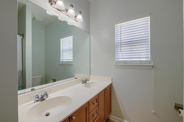 9682 Pebble Creek Blvd, Summerville, SC 29485 - bathroom with double vanity, toilet, and a shower with curtain