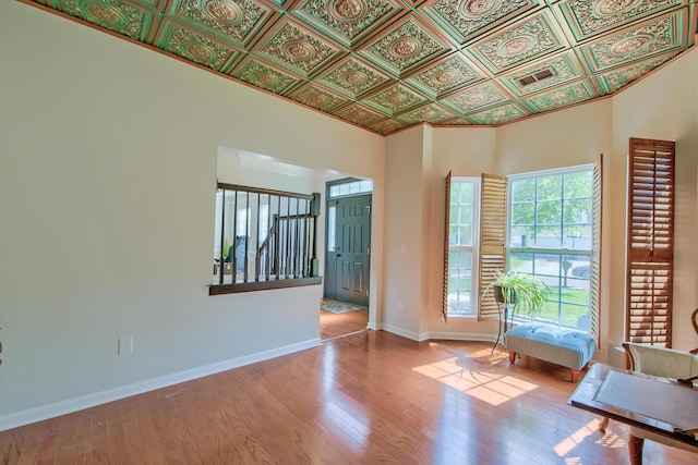 9682 Pebble Creek Blvd, Summerville, SC 29485 - entrance foyer with an ornate ceiling, hardwood / wood-style floors, and baseboards