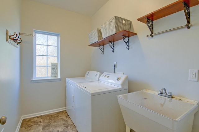 9682 Pebble Creek Blvd, Summerville, SC 29485 - laundry area with washing machine and clothes dryer, baseboards, and healthy amount of natural light