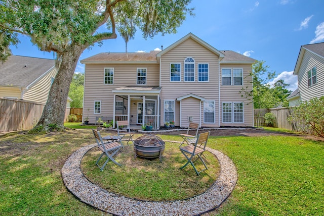 9682 Pebble Creek Blvd, Summerville, SC 29485 - rear view of house with an outdoor fire pit