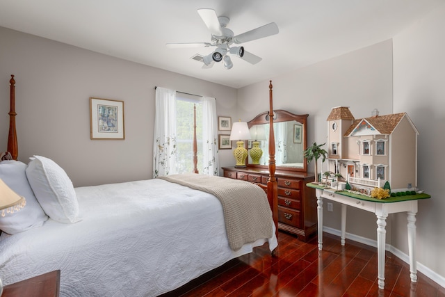 bedroom featuring access to outside, baseboards, and wood finished floors