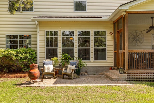 exterior space with a ceiling fan