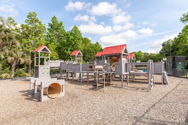 community play area featuring fence