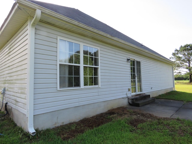 view of property exterior with entry steps