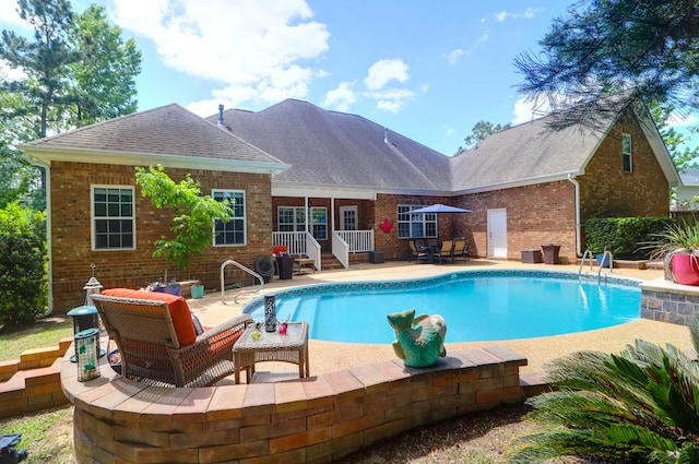 view of pool with a fenced in pool and a patio
