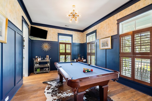 566 Wading Pl, Daniel Island, SC 29492 - rec room with pool table, light wood finished floors, ornamental molding, a decorative wall, and a chandelier