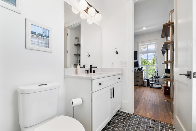 566 Wading Pl, Daniel Island, SC 29492 - bathroom featuring vanity, wood finished floors, recessed lighting, and crown molding