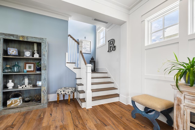 566 Wading Pl, Daniel Island, SC 29492 - stairs with wood finished floors