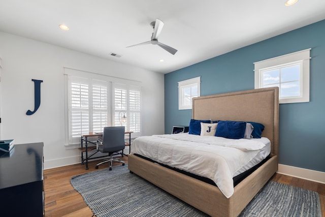 566 Wading Pl, Daniel Island, SC 29492 - bedroom with ceiling fan, wood finished floors, recessed lighting, and an office area