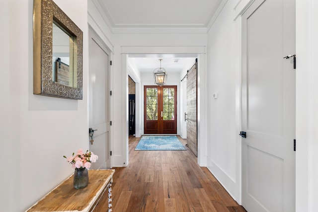 566 Wading Pl, Daniel Island, SC 29492 - entrance foyer with wood-type flooring and ornamental molding