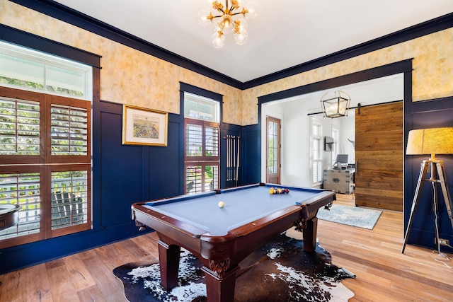 566 Wading Pl, Daniel Island, SC 29492 - recreation room with a chandelier, billiards table, wood-type flooring, a decorative wall, and ornamental molding