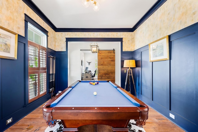 566 Wading Pl, Daniel Island, SC 29492 - recreation room featuring a decorative wall, billiards, wood finished floors, wainscoting, and ornamental molding