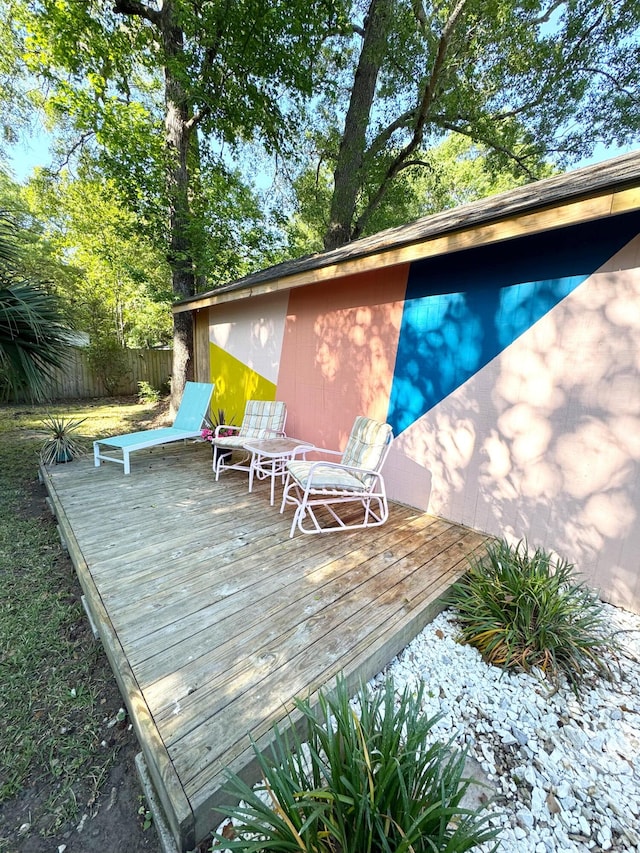 wooden terrace featuring fence private yard