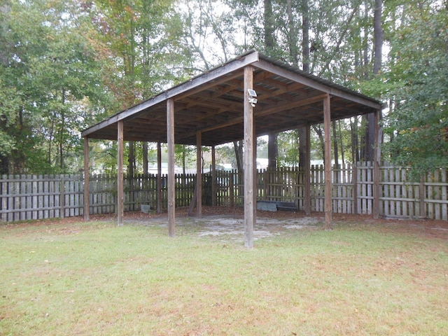 view of home's community with a yard