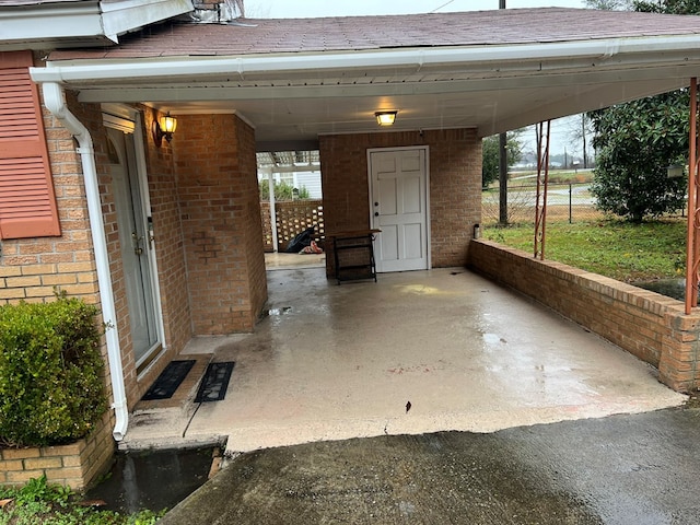 view of patio / terrace featuring a carport