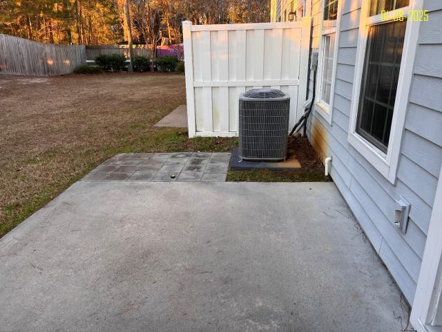 view of patio with cooling unit