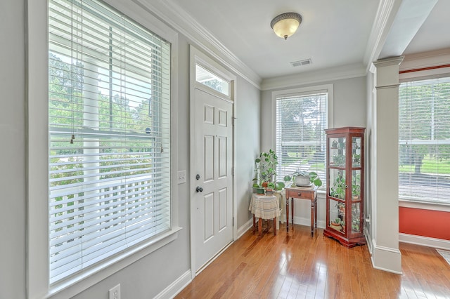 1408 Bimini Dr, Charleston, SC 29414 - foyer with baseboards, wood-type flooring, ornamental molding, and decorative columns