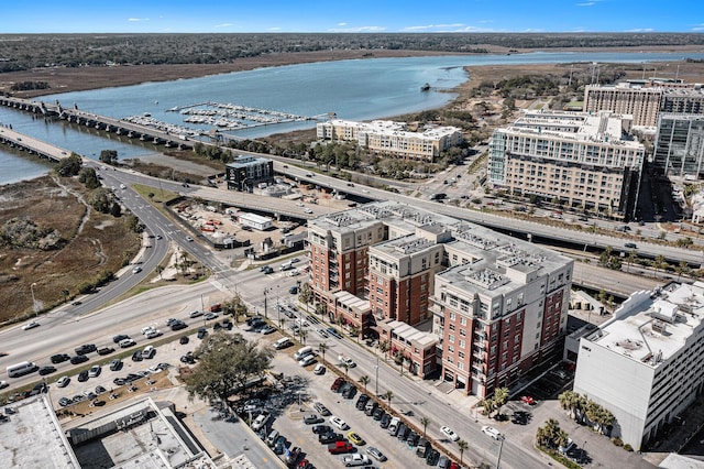 bird's eye view with a view of city and a water view