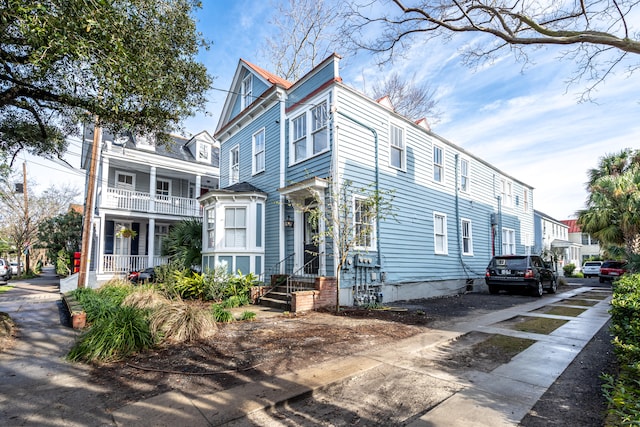 view of front of home with a balcony