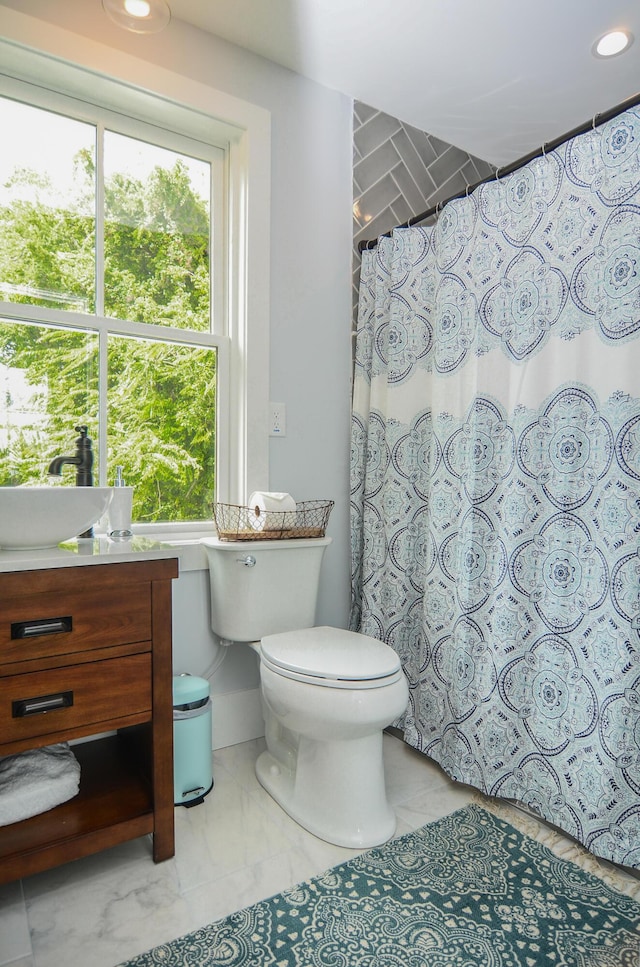 206 Ashley Ave Unit A, B, C, D, E, Charleston, SC 29403 - bathroom with curtained shower, a sink, toilet, marble finish floor, and recessed lighting