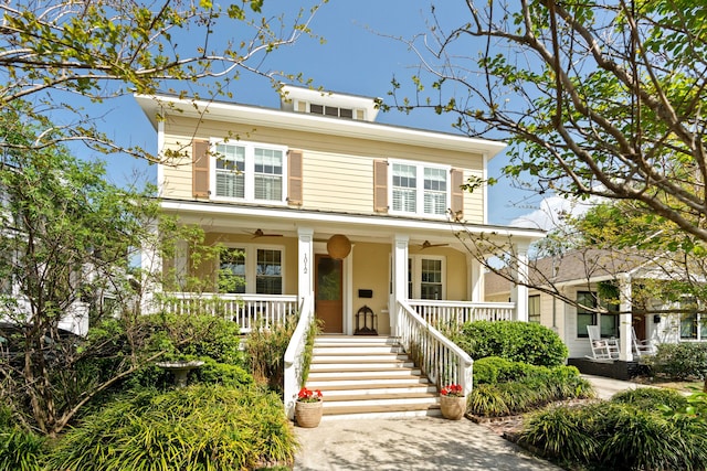 1012 Ashley Ave, Charleston, SC 29403 - american foursquare style home featuring a porch, a ceiling fan, and stairway