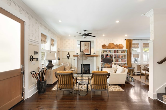 1012 Ashley Ave, Charleston, SC 29403 - living area with ceiling fan, hardwood / wood-style floors, wallpapered walls, and a fireplace