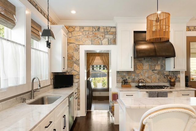 1012 Ashley Ave, Charleston, SC 29403 - kitchen featuring white cabinets, a sink, crown molding, pendant lighting, and appliances with stainless steel finishes