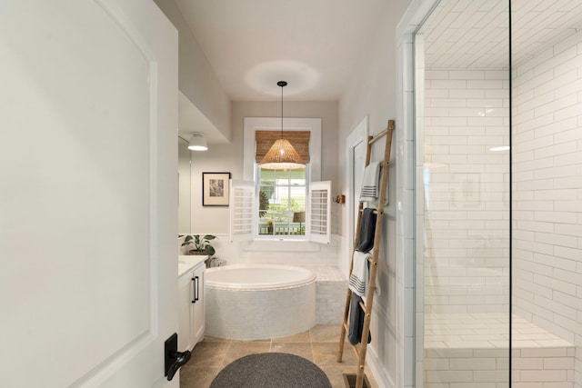 1012 Ashley Ave, Charleston, SC 29403 - full bathroom featuring tile patterned flooring, visible vents, vanity, a garden tub, and tiled shower