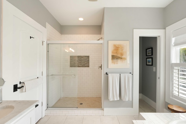 1012 Ashley Ave, Charleston, SC 29403 - bathroom featuring vanity, tile patterned flooring, and a stall shower