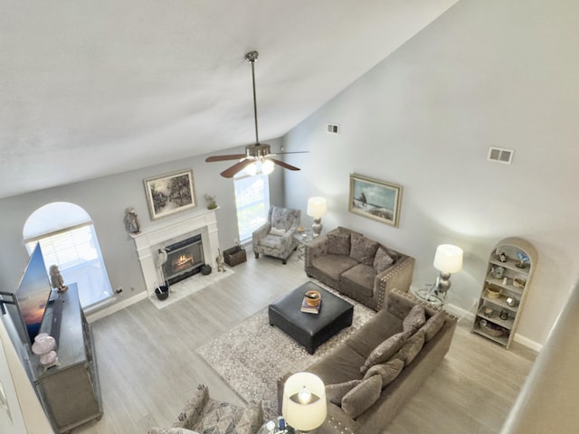 482 Planters Trace Dr, Charleston, SC 29412 - living area featuring wood finished floors, ceiling fan, lofted ceiling, and plenty of natural light