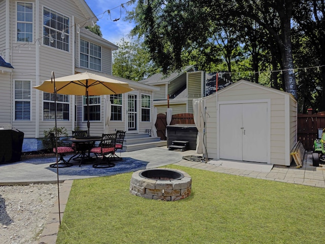482 Planters Trace Dr, Charleston, SC 29412 - rear view of property with a patio, a fire pit, a hot tub, and entry steps