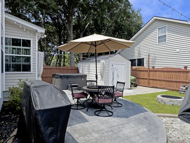 482 Planters Trace Dr, Charleston, SC 29412 - view of patio / terrace with a hot tub, outdoor dining area, an outdoor fire pit, and a grill