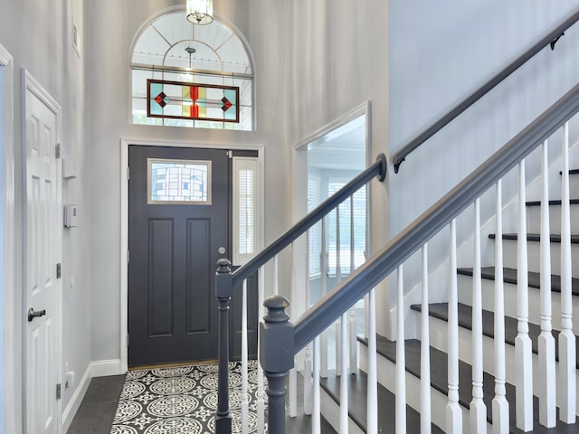 482 Planters Trace Dr, Charleston, SC 29412 - foyer entrance with a high ceiling, stairway, baseboards, and dark tile patterned floors