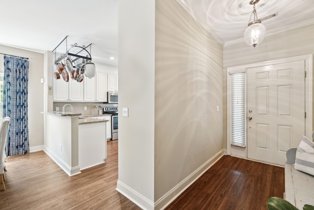 708 Lawton Harbor Dr, Charleston, SC 29412 - entryway with dark wood finished floors and ornamental molding
