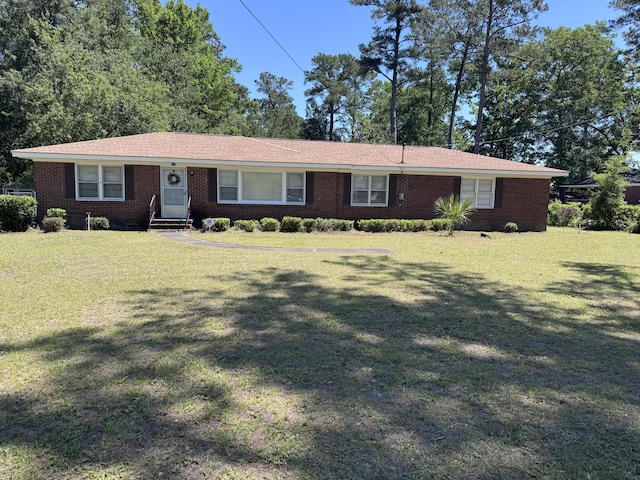 686 W Pine St, Varnville, SC 29944 - ranch-style home featuring a front yard, brick siding, and entry steps