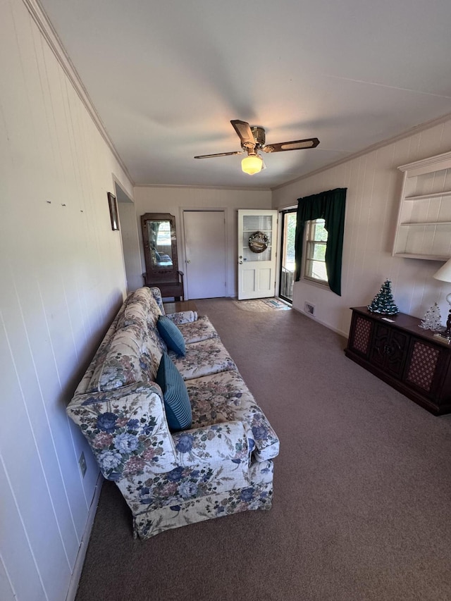 686 W Pine St, Varnville, SC 29944 - living room with carpet flooring, a ceiling fan, and crown molding