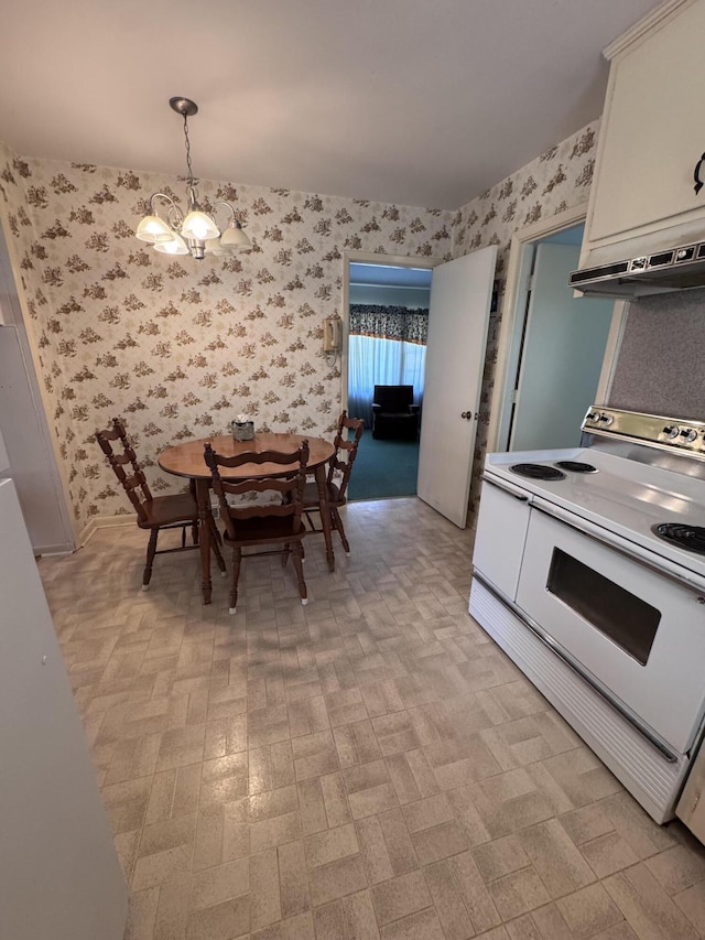 686 W Pine St, Varnville, SC 29944 - dining room with wallpapered walls and a chandelier