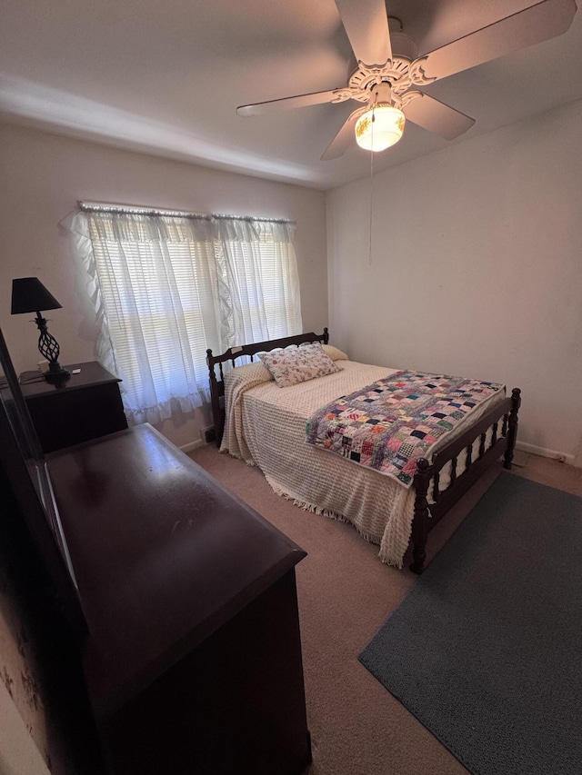 686 W Pine St, Varnville, SC 29944 - carpeted bedroom featuring a ceiling fan